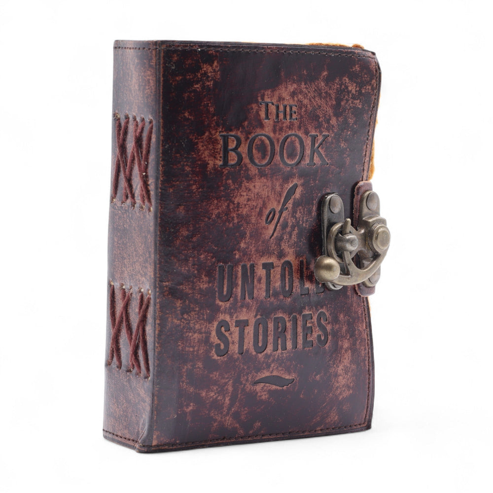 Decorative leather-bound book with a lock on a white background