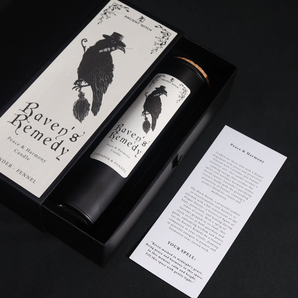 Candle packaging with 'Raven's Remedy' branding on a dark background