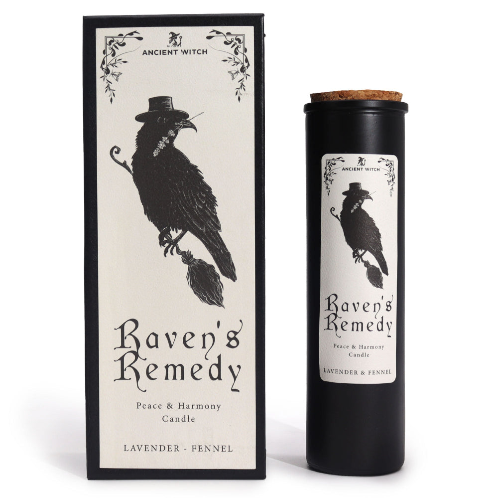 Candle packaging with a raven design labeled 'Raven's Remedy' on a white background