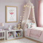 Framed artwork of a girl in a pink dress with 'Emily' and text on a light purple wall.