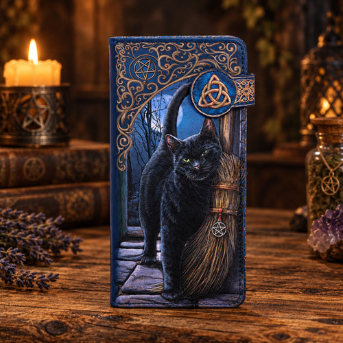 Decorative book with a blue cover and gold text on a dark background. Brush with Magick artwork by Lisa Parker. Sold by Eleanora Moon