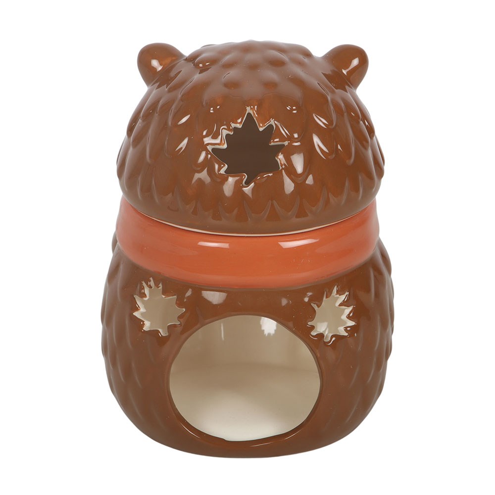 Brown ceramic oil burner shaped like a hedgehog on a white background