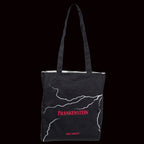 Black tote bag with 'Frankenstein' and 'Mary Shelley' text on a white background