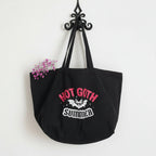 Black tote bag with 'Hot Goth Summer' text and a bat graphic at Eleanora Moon