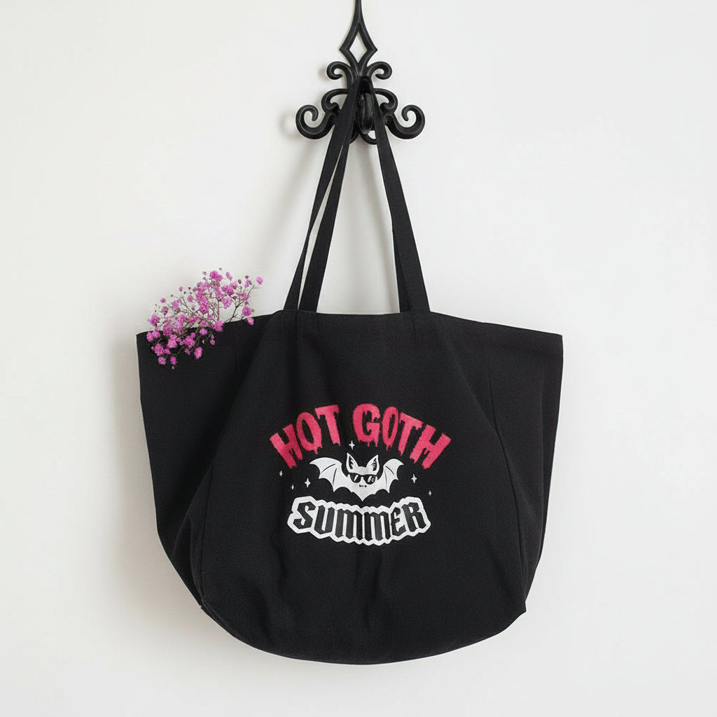 Black tote bag with 'Hot Goth Summer' text and a bat graphic at Eleanora Moon