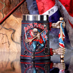 Iron Maiden-themed mug with band logo and British flag design, placed against a textured background.
