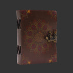 Brown leather journal with decorative patterns and a latch on a white background
