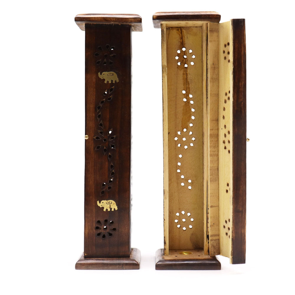 Wooden decorative stands with elephant designs on a white background