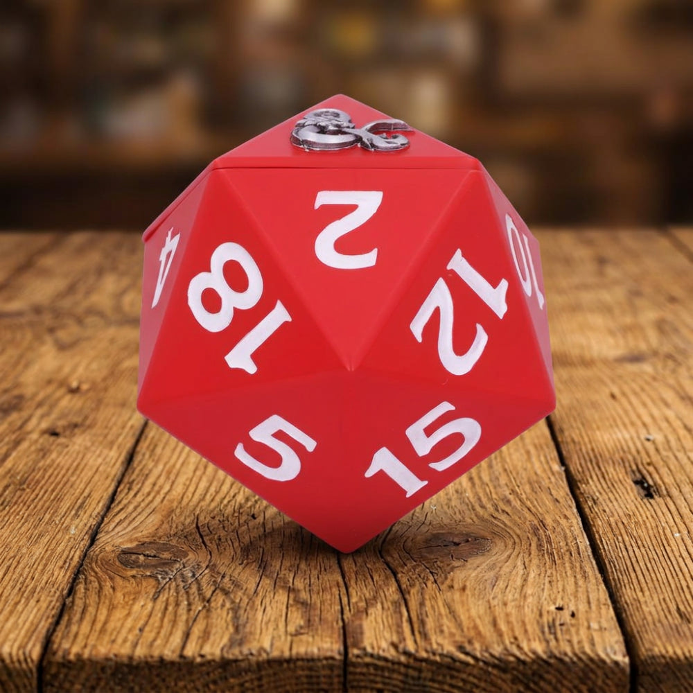 Red polyhedral dice with white numbers on a white background
