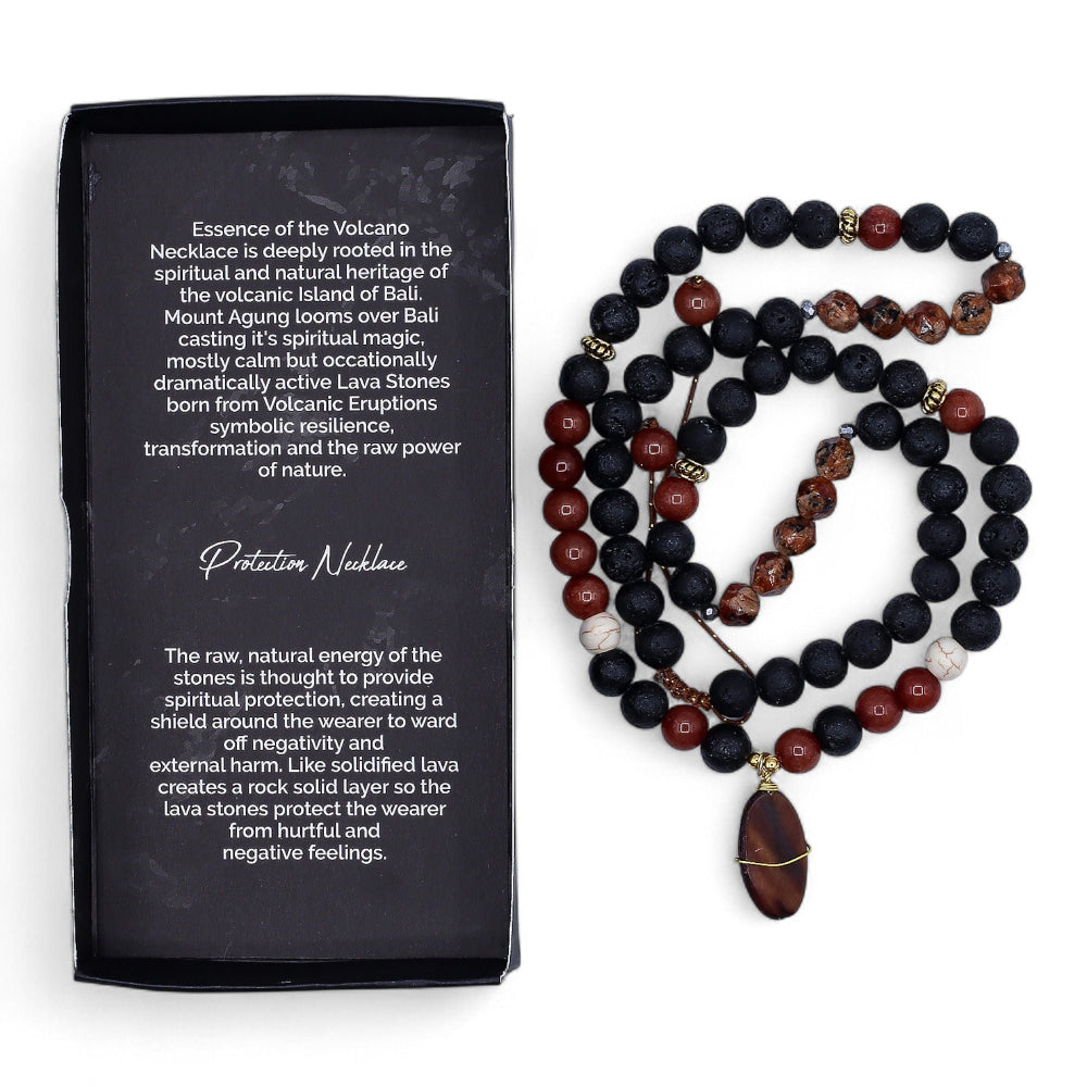Beaded necklace with dark and red beads next to a black box with text on a white background