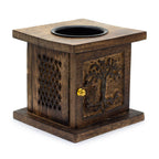 Wooden square incense burner with decorative carvings on a white background