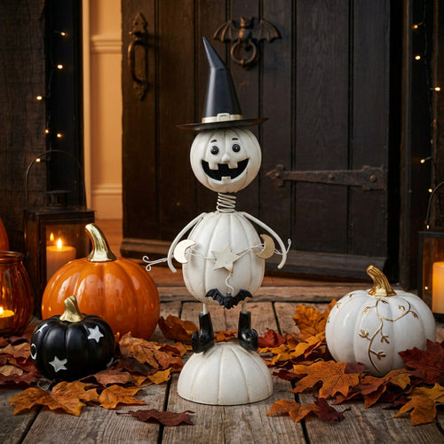 Halloween-themed pumpkins with a skeleton figure and witch hat on a white background