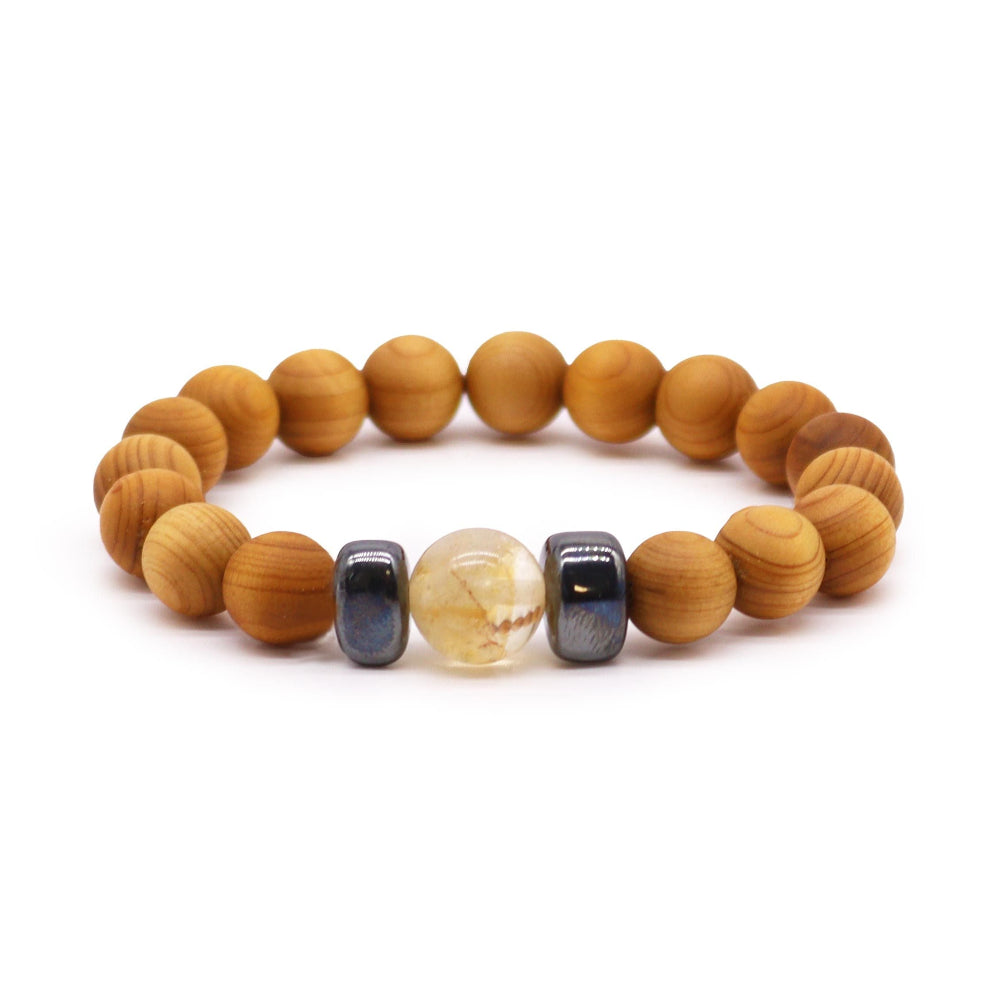 Wooden beaded bracelet with colorful focal beads on a white background