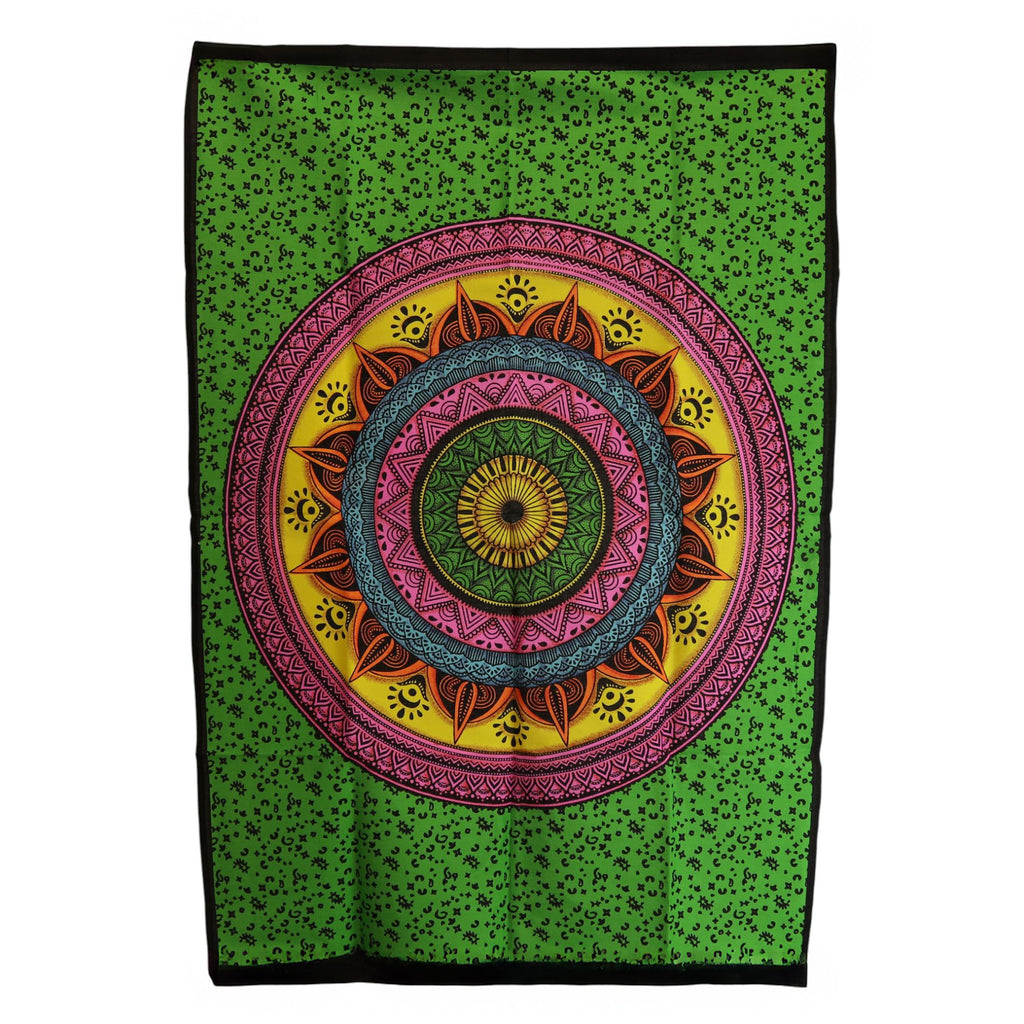 Colorful mandala tapestry on a green background