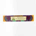Incense stick box with colorful design and 'Palosanto with Sandalwood' text on a white background