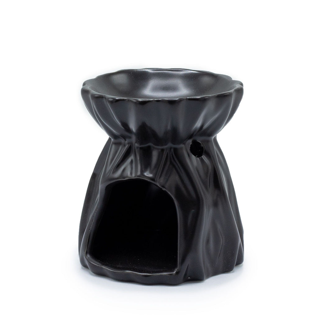 Black ceramic oil burner on a white background