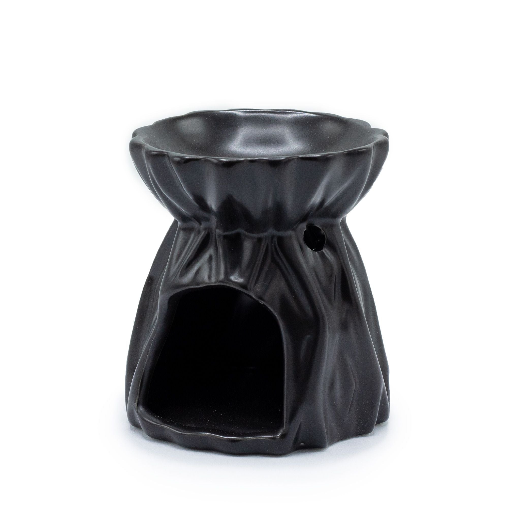 Black ceramic oil burner on a white background