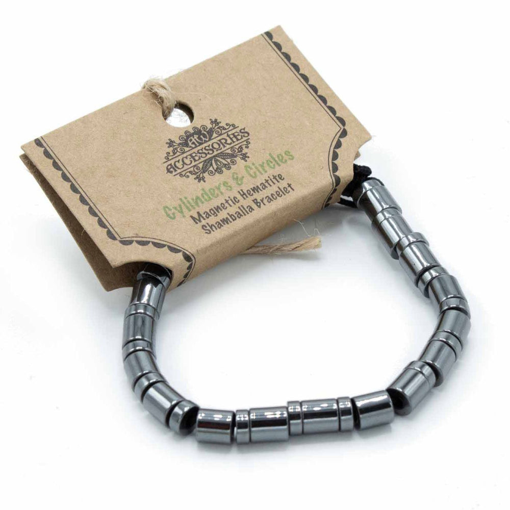 Silver magnetic hematite Shamballa bracelet with a branded tag on a white background