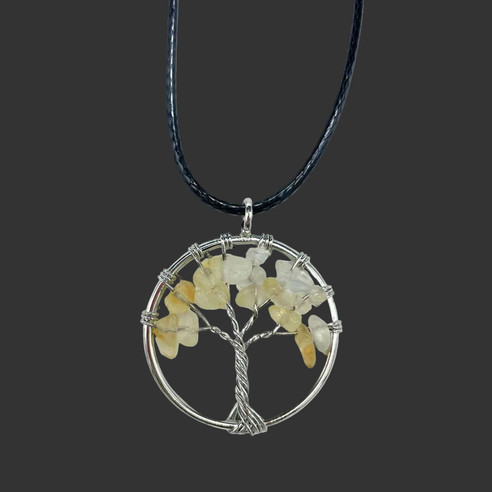 Tree of Life pendant with stones on a black cord against a white background