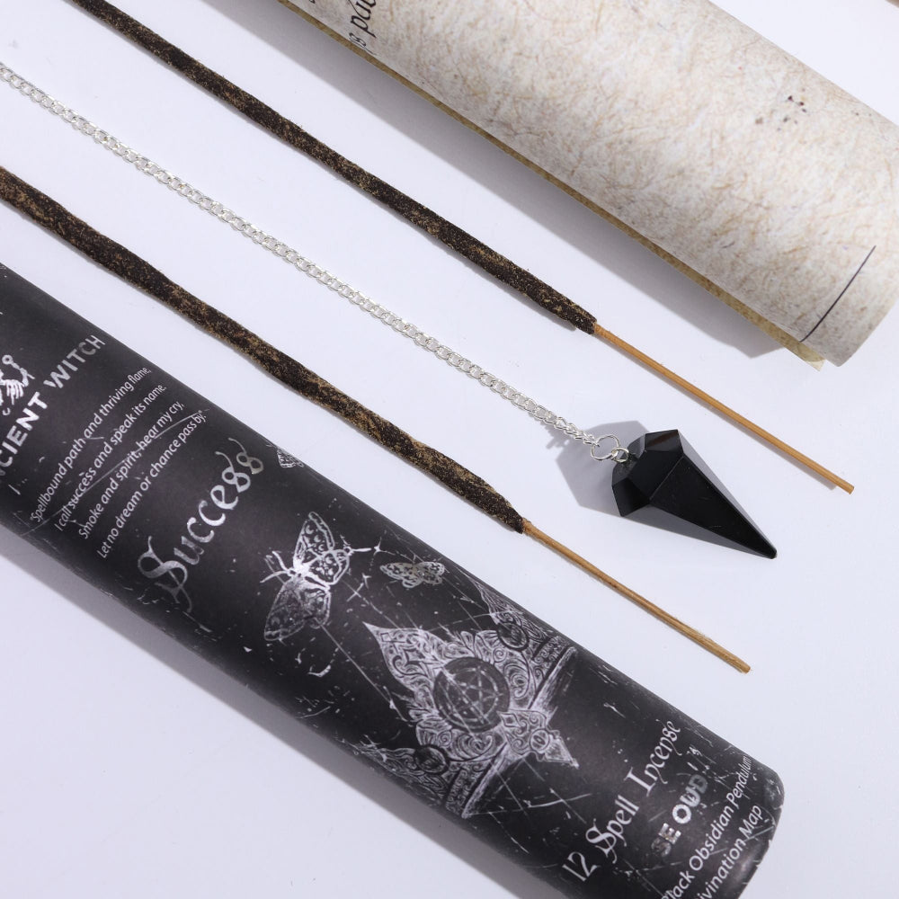 Incense sticks with a black packaging labeled 'Ancient Witch' on a white background