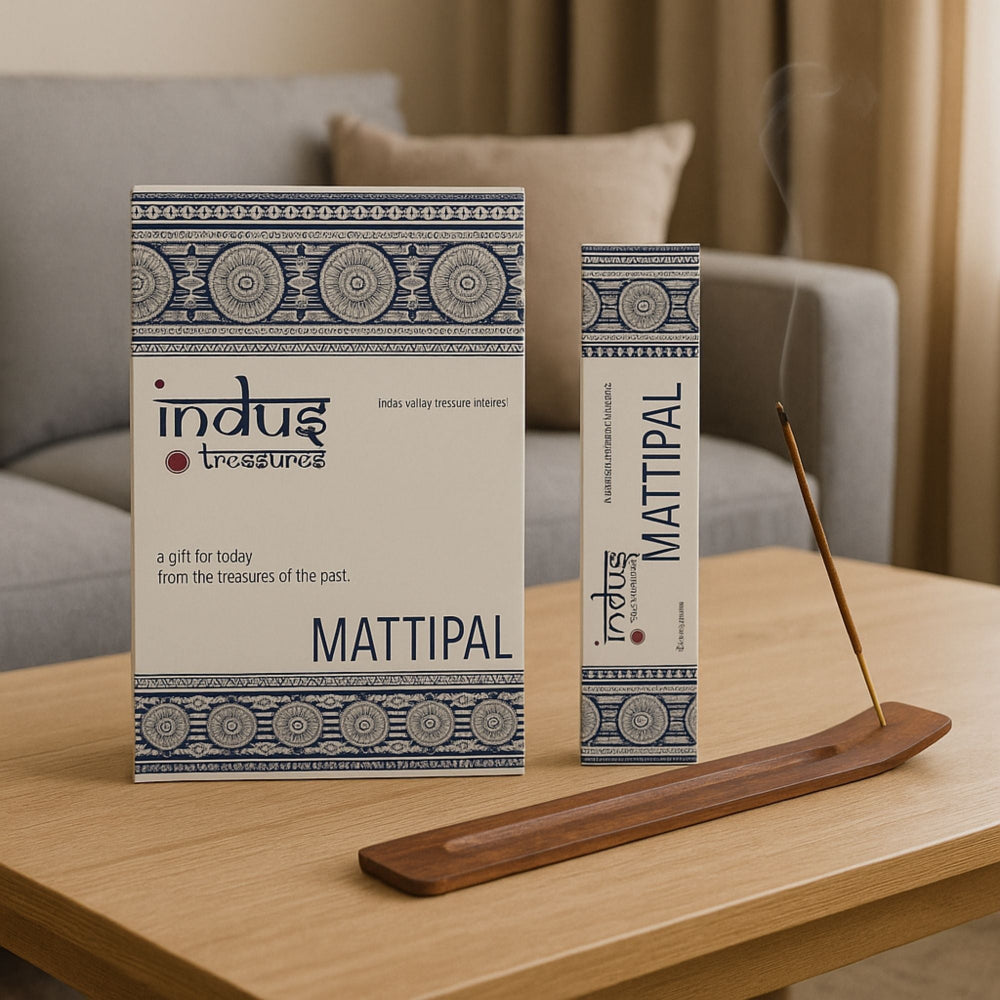 Indus Treasures MATTIPAL incense packaging on a table with an incense stick.