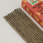 Palo Santo incense sticks with a box labeled 'Traditional Incense' on a light gray background