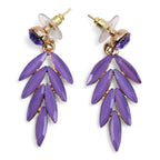 Purple leaf-shaped earrings with gold accents on a white background