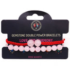 Set of gemstone double power bracelets on a black card with 'Love and Harmony' text.