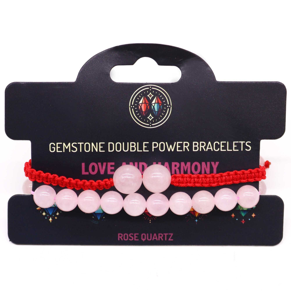 Set of gemstone double power bracelets on a black card with 'Love and Harmony' text.
