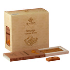 A box of Ishom Smudge Incense Bricks shown with an open tray of rectangular incense pieces and a single incense brick in front, on a plain white background.