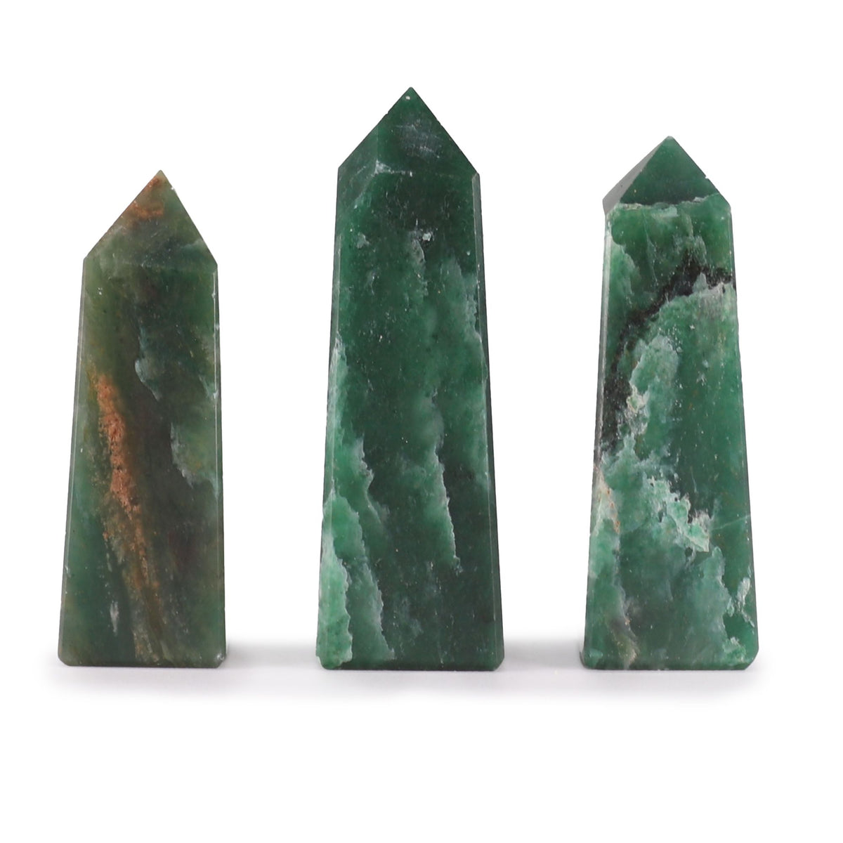 Three green marbled stone obelisks on a white background