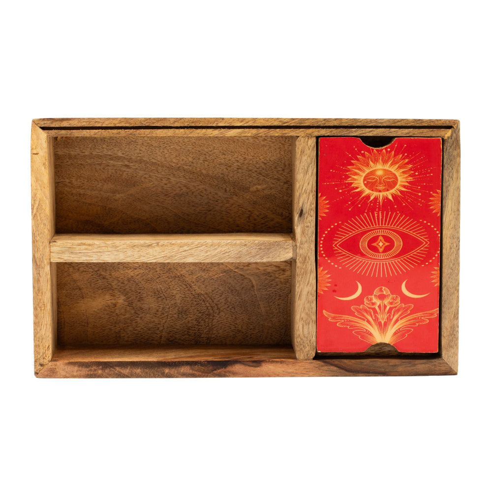 Wooden box with a red card featuring celestial designs on a white background