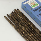 Palo Santo sticks with a blue box labeled 'Palo Santo with Citrus' on a white background
