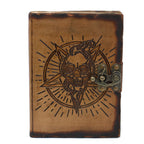 Brown leather journal with skull and snake design on a white background