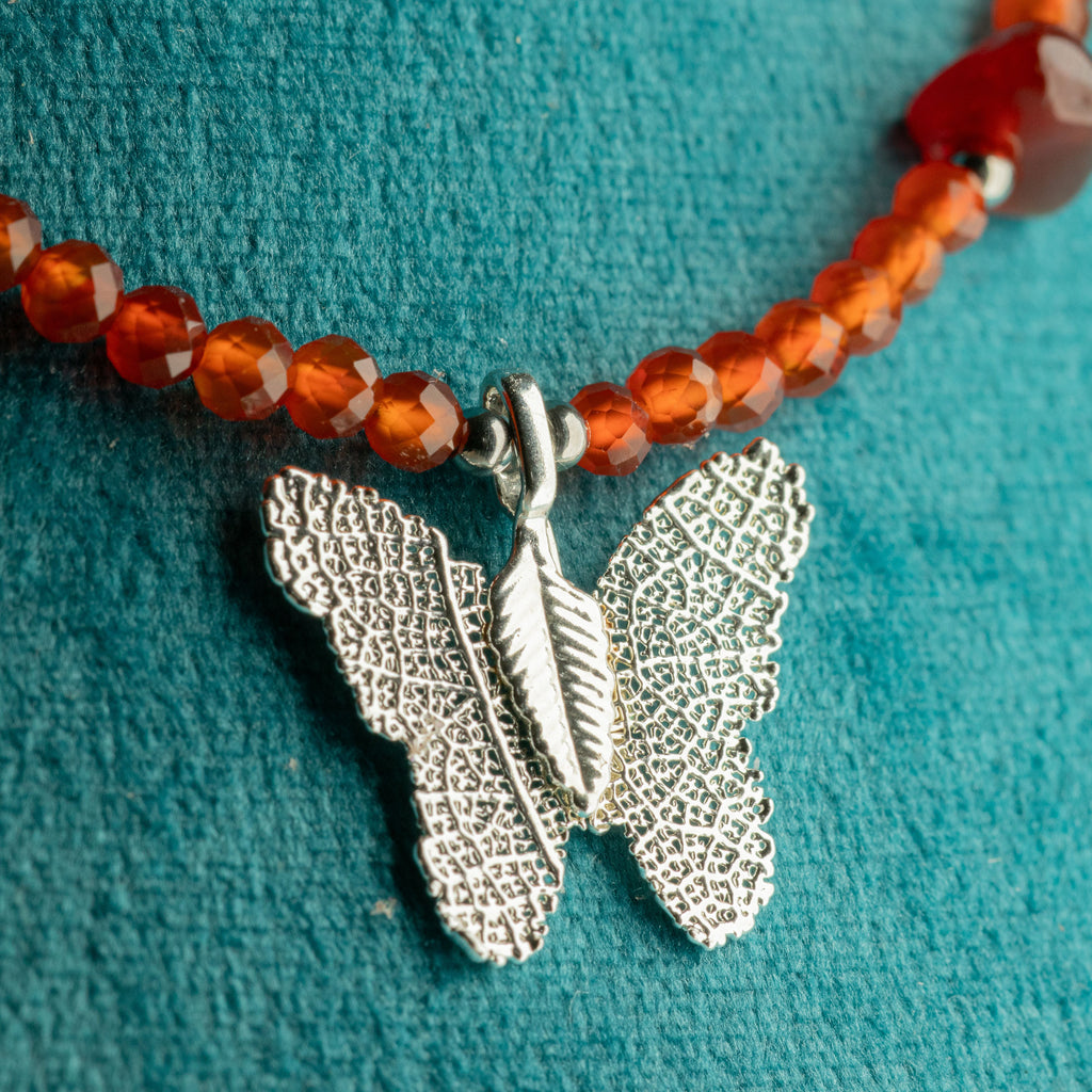 Nymph Ruby Gemstone Necklace with Real Leaf Butterfly Pendant