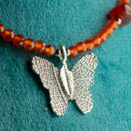Nymph Ruby Gemstone Necklace with Real Leaf Butterfly Pendant