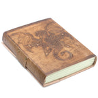 Brown leather-bound book with embossed design on a white background