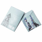 Necklace displayed on a branded card with a white background