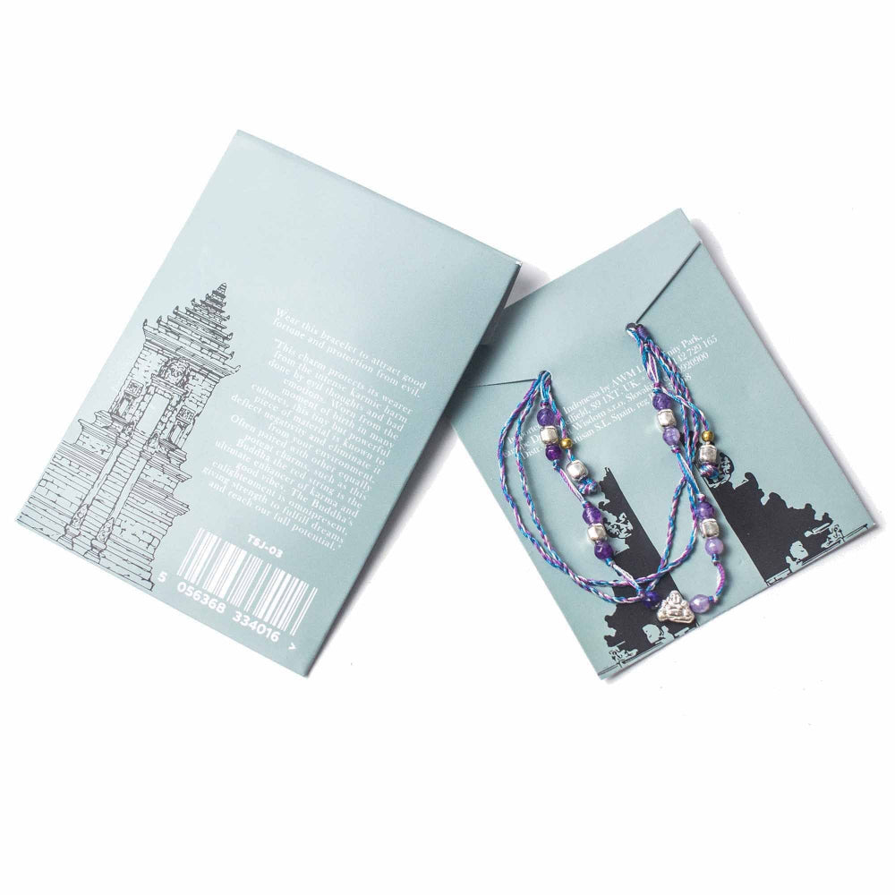 Necklace displayed on a branded card with a white background