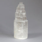 Clear crystal tower on a gray background