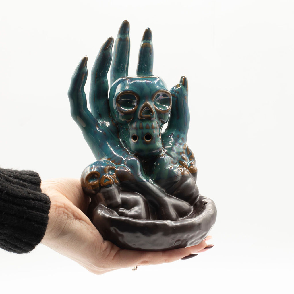 Skull in Hand Backflow Incense Burner
