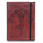 Red leather notebook with embossed design of a person in a yoga pose on a white background