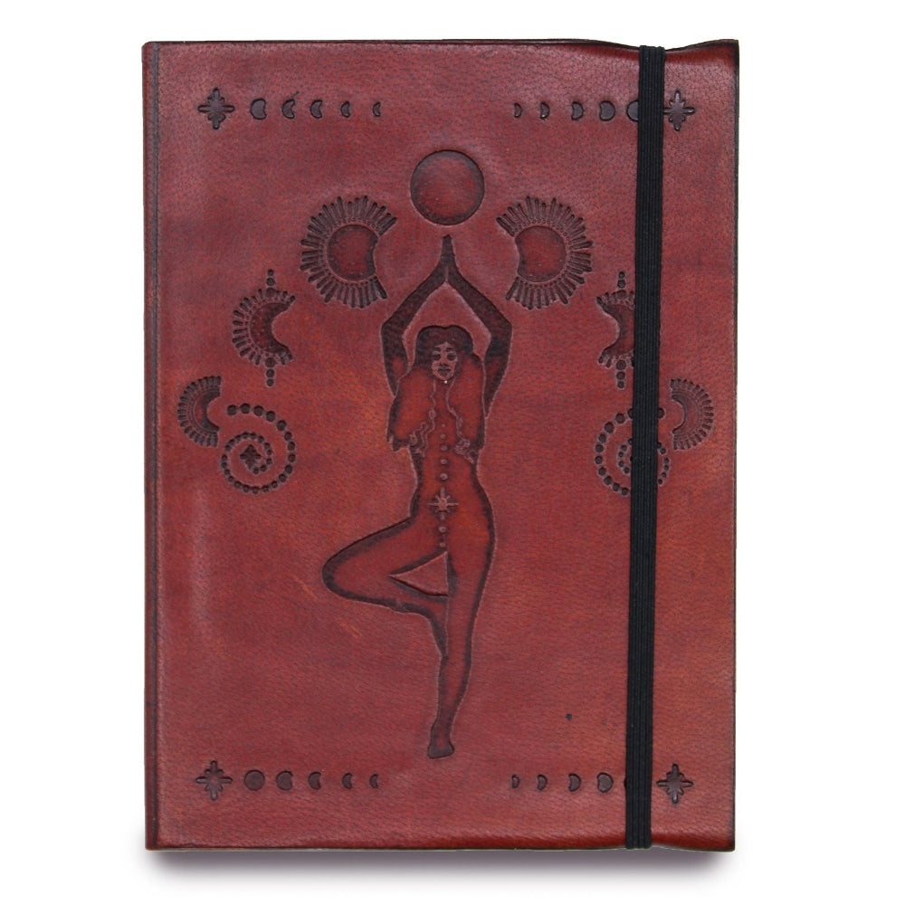 Red leather notebook with embossed design of a person in a yoga pose on a white background
