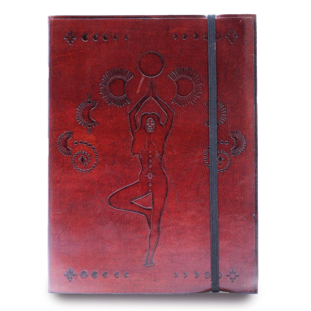 Red notebook with embossed design on a white background