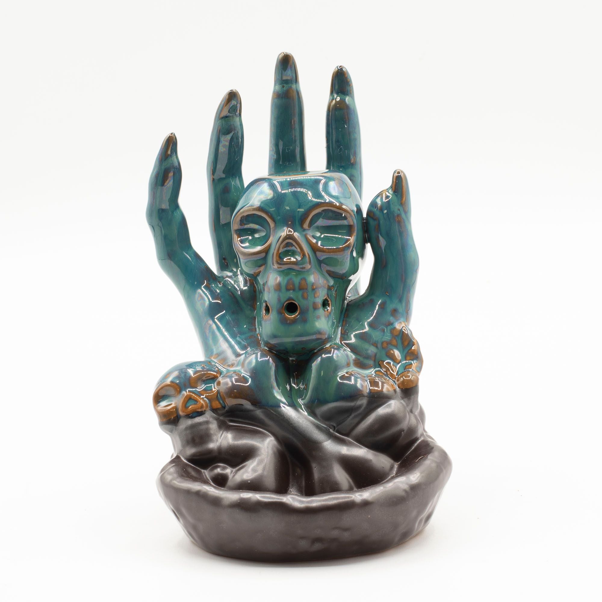 Skull in Hand Backflow Incense Burner