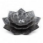 Decorative metal lotus flower on a white background