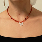 Nymph Ruby Gemstone Necklace with Real Leaf Butterfly Pendant