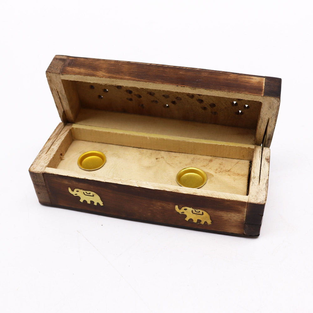 Wooden incense box with elephant designs on a white background