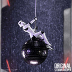 Stormtrooper figure sitting on a disco ball hanging ornament